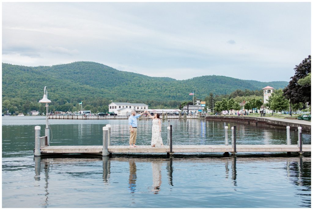 couple dancing on a dock in Lake George, New York