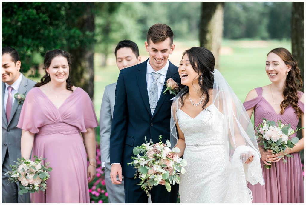 bridal party laughing together, new york wedding photographer 