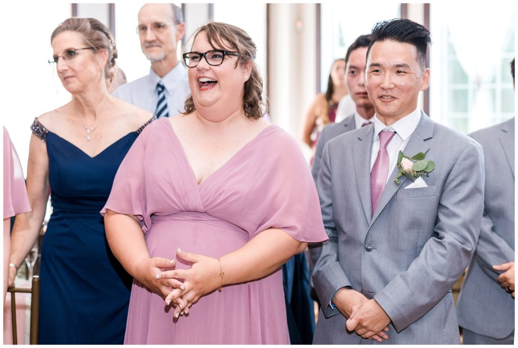 Guest reaction during husband and wife's first dance 