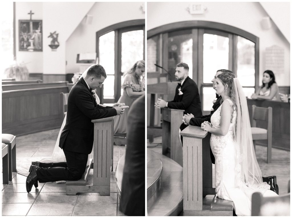 bride and groom kneeling in prayer